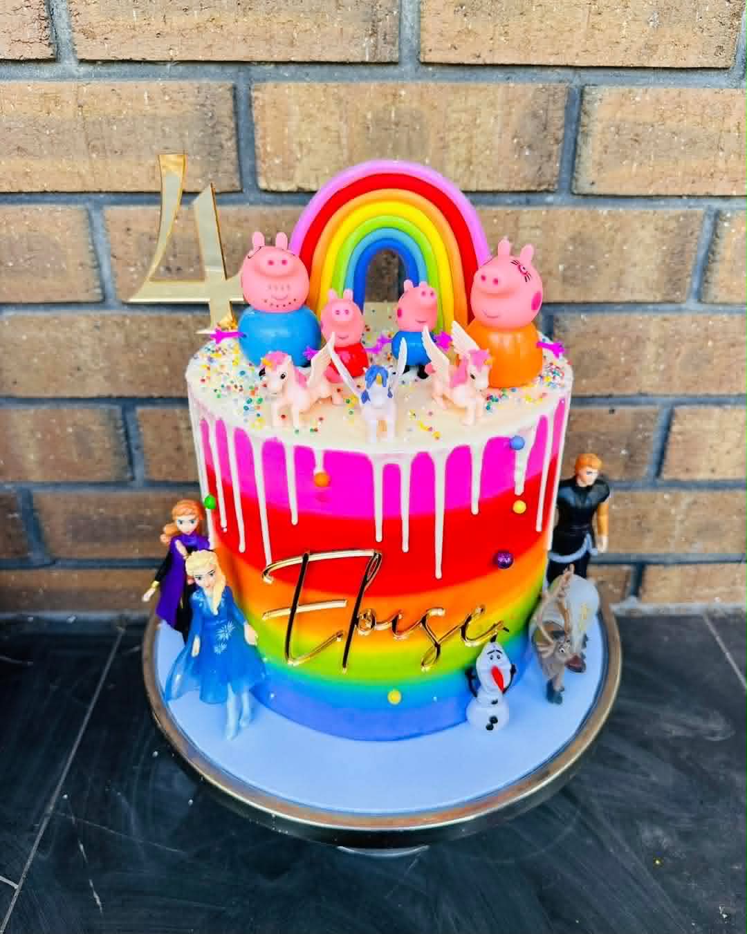 Rainbow ombre birthday cake for Eloise's 4th with Peppa Pig family, Frozen characters, unicorns and rainbow arch topper